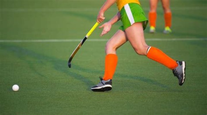 Can you kick the ball in hockey?